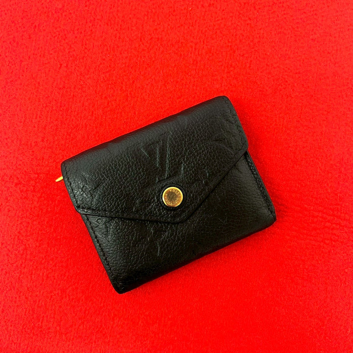 三つ折り財布 ルイヴィトン ポルトフォイユ・ゾエ