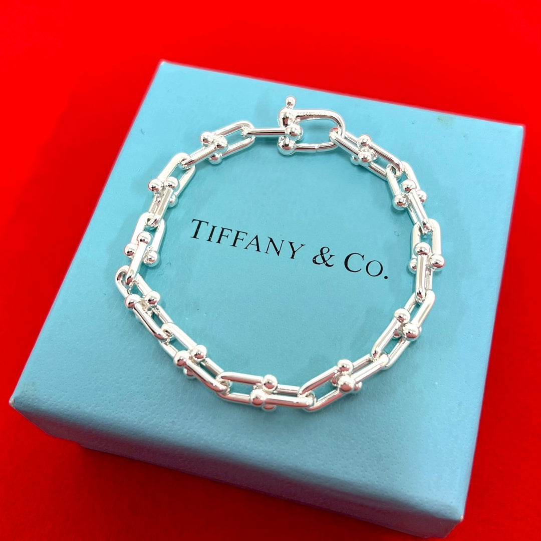 blurRubbingTiffany Hardware Small Link
