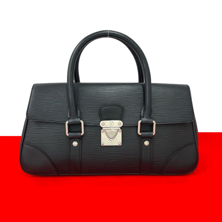 Handbag Louis Vuitton Segur PM