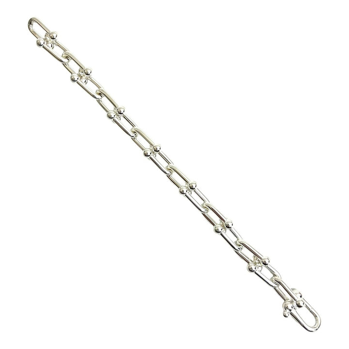 blurRubbingTiffany Hardware Large Link BureRubbingCut