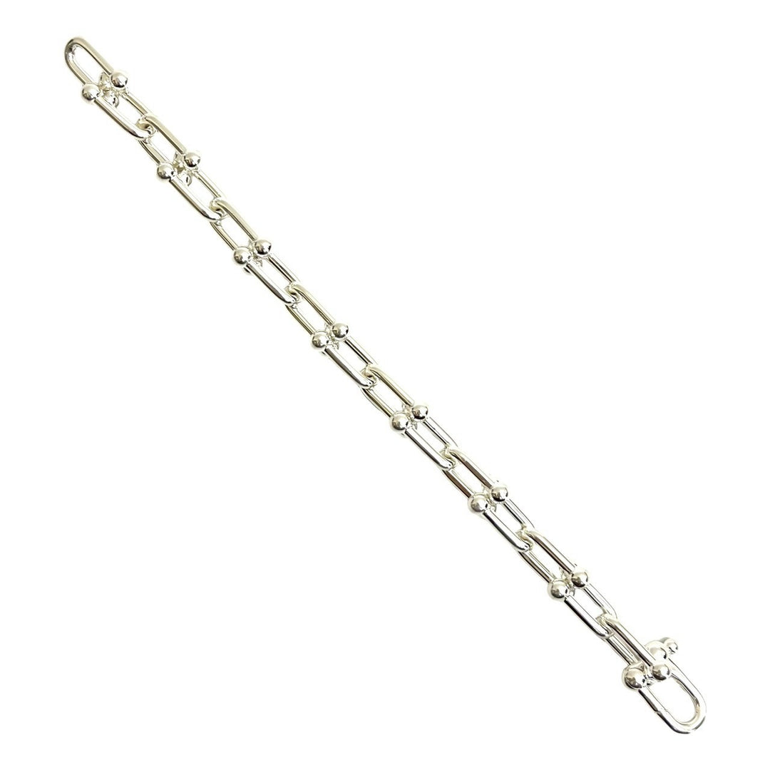 blurRubbingTiffany Hardware Large Link BureRubbingCut