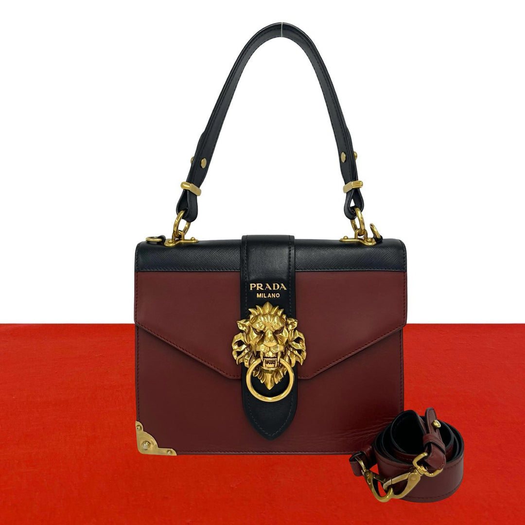 shoulder bag prada cahier lion head
