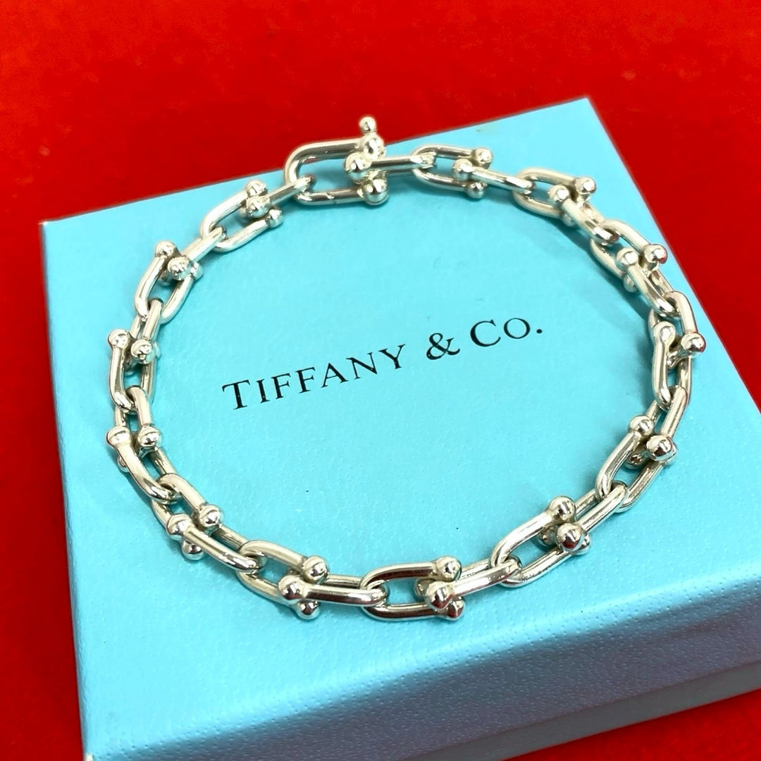 blurRubbingTiffany Hardware Small Link BureRubbingCut